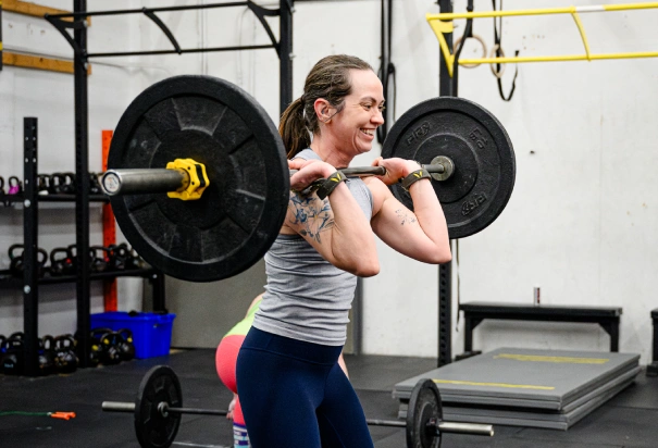 CrossFit 701 Woman Training with Barbell